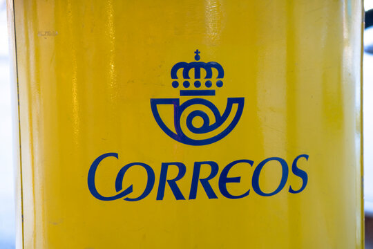 Palma de Mallorca, Spain - September 24, 2017.: Correo's letterbox. Correos, is a state-owned company,  providing postal service in Spain.
