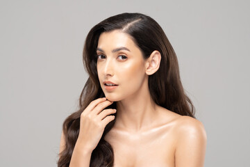 Naklejka premium Beautiful Glamour indian woman touch chin smile with clean and fresh skin Happiness and cheerful with positive emotional,isolated on grey background,Beauty Cosmetics and spa Facial treatment Concept