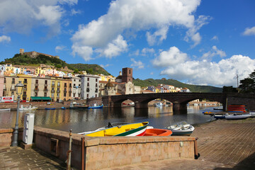 Panorama of Bosa with bridge over Temo river ,Colorful houses and medieval castle, Italy
