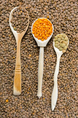 red, green, red lentils culinaris top view. Selective focus. vertical photo