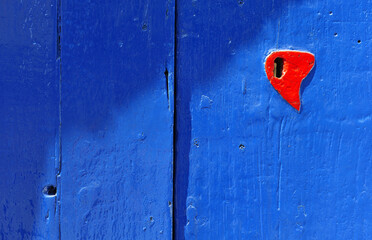 Stromboli Island. painted door with symbol of love