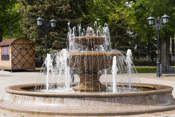 Round fountain with frozen water jets.