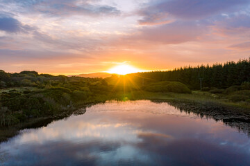 Aerial of lake in a peatbog by Clooney, Portnoo - County Donegal, Ireland