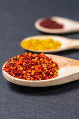 spices and herbs over dark old wood. Cooking ingredients. Food and cuisine concept. vertical photo