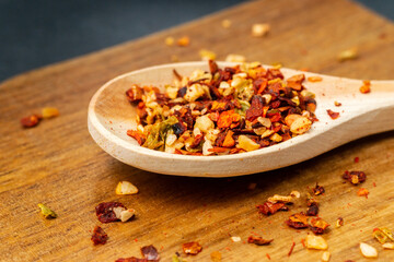 spices and herbs over dark old wood. Cooking ingredients. Food and cuisine concept.