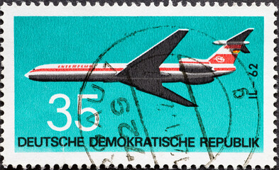 GERMANY, DDR - CIRCA 1972: a postage stamp from Germany, GDR showinga travel plane Ilyushin IL 62