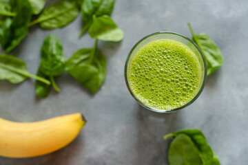 Spinach smoothie with orange, grapefruit and banana.