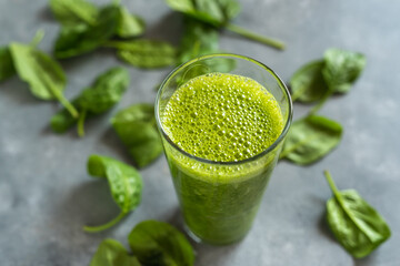 Spinach smoothie with orange, grapefruit and banana.