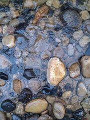 Pebbles in a clear water river