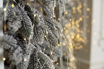 Christmas tree blur garland close-up New year background