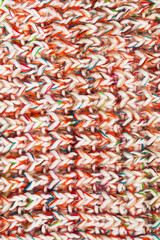 texture of colourful knitted scarf