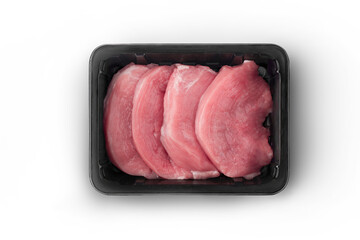 Opened black plastic tray with raw meat schnitzels top-view. Packaging template mockup collection....