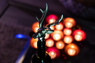 Wine bottle closure in the shape of a deer's head