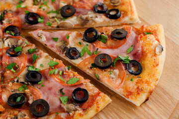 Pizza top view cutted on 8 pieces and one pushed forward. Advert for pizzeria caffee and restaurant. Food delivery at quarantine covid-19 concept.