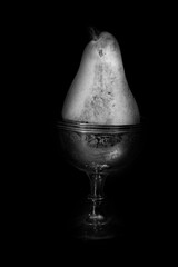 black and white effect pear fruit on silver cup