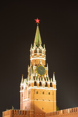 Fototapeta na wymiar Spasskaya Tower. Spasskaya Tower on Red Square at night in the light of lamps.