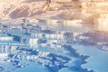 Pamukkale is the main natural wonder of Turkey and the Middle East. White travertines with thermal water. It is a very popular tourist attraction that attracts thousands of tourists.