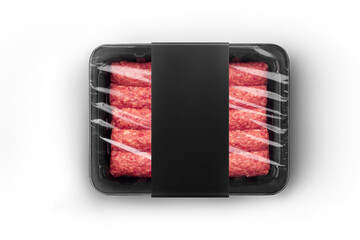 Sealable black plastic tray with black paper label filled with fresh raw beef kebabs top-view. Packaging template mockup collection. With clipping Path included.