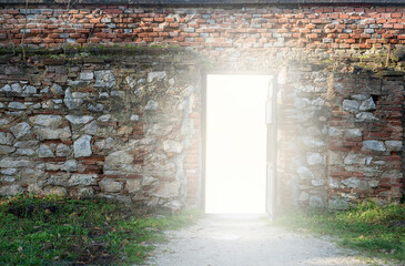 Stoned wall with a open door and white glow