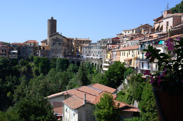 View on ancient town Nemi, located on Alban hills overlooking volcanic crater lake Nemi, Castelli Romani, Italy