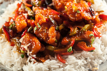 Sweet and sour chicken with colorful bell pepper with rice