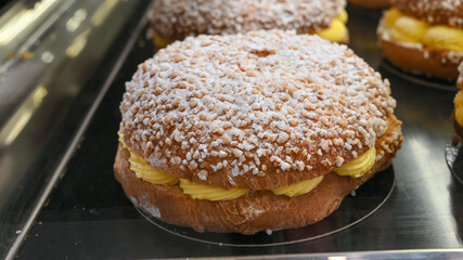 French fresh baked sweet filled brioche pastry tarte tropezienne in confectionery shop in Saint-Tropez, Provence, France