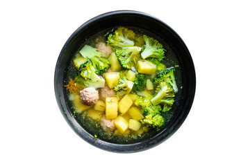 soup meatballs, broccoli and vegetables first course meat broth top view copy space for text food background rustic keto or paleo diet