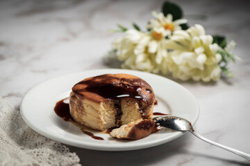 High angle shot of a homemade pie with caramel sauce