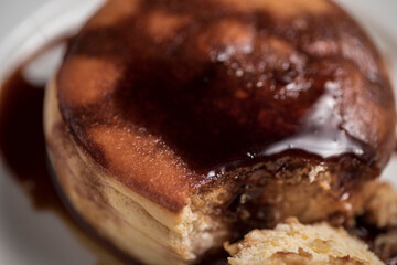 Closeup shot of a fresh homemade pie with caramel sauce