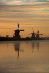 windmills at sunset