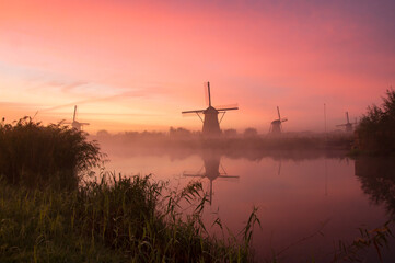 windmills at sunset