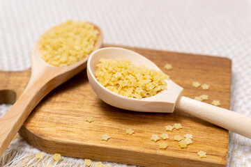 Star shaped noodles. Italian pasta for soup, stelline. close up