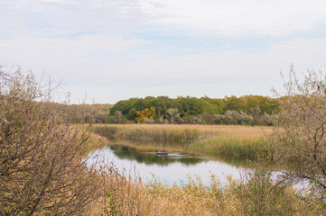 fisherman in a boat on the river