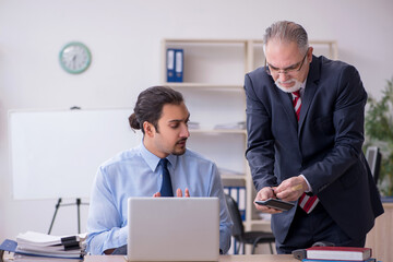 Two employees in the office