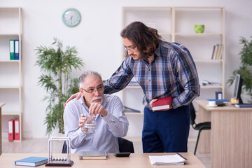 Fototapeta premium Two employees in retirement concept