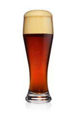 Glass of brown dark beer isolated on a white