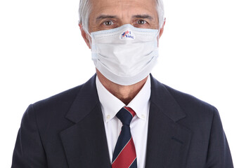 Closeup of a businessman with an I Voted sticker on the COVID-19 protective mask he wore to vote.