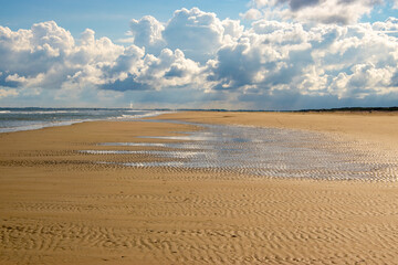 Fototapeta na wymiar Beach view with beautiful clouds