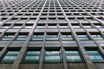 Texture. High-rise office building windows and sky. Skyscraper windows
