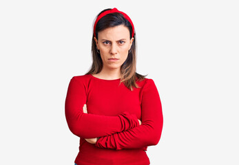 Young beautiful woman wearing casual clothes skeptic and nervous, disapproving expression on face...