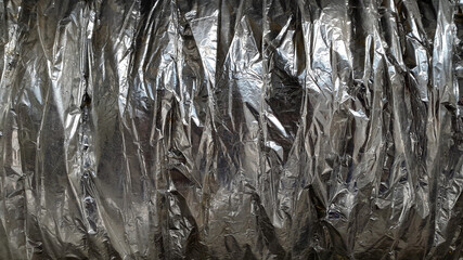 Crumpled foil. Background of crumpled foil. Creative background