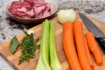 Staple ingredients for making homemade winter soups and stews for family meals and freezing for quick dinners