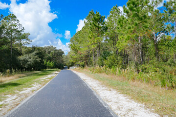 A biking  trail in a sunny day in Florida. Taken in Flatwood park in Tampa. Florida