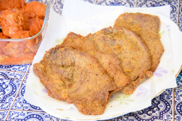 Breaded and Fried Cutlets in the Plate