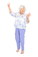 A senior elderly woman in a floral print blouse isolated on a white background.
