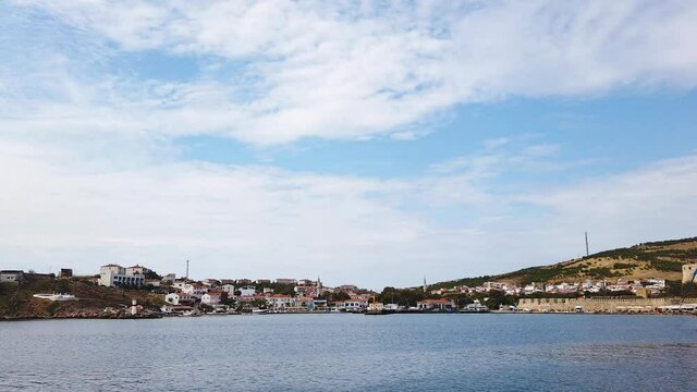 Time Lapse video of Bozcaada Island port and medieval castle. Canakkale Province, Turkey.