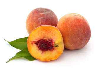Sliced peach and leaves.