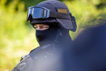 SWAT team on scouting mission in industrial area