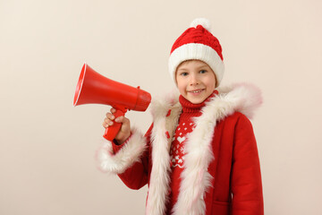Child dressed as Santa Claus, isolated on white.