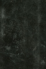 Old vintage texture of black matte scratched surface